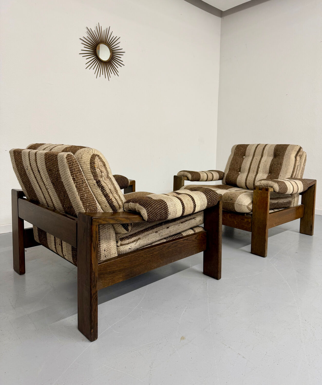 2 vintage 1970s wooden and fabric armchairs