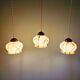 Trio of Art Deco marbled opaline pendant lights, 1920-30