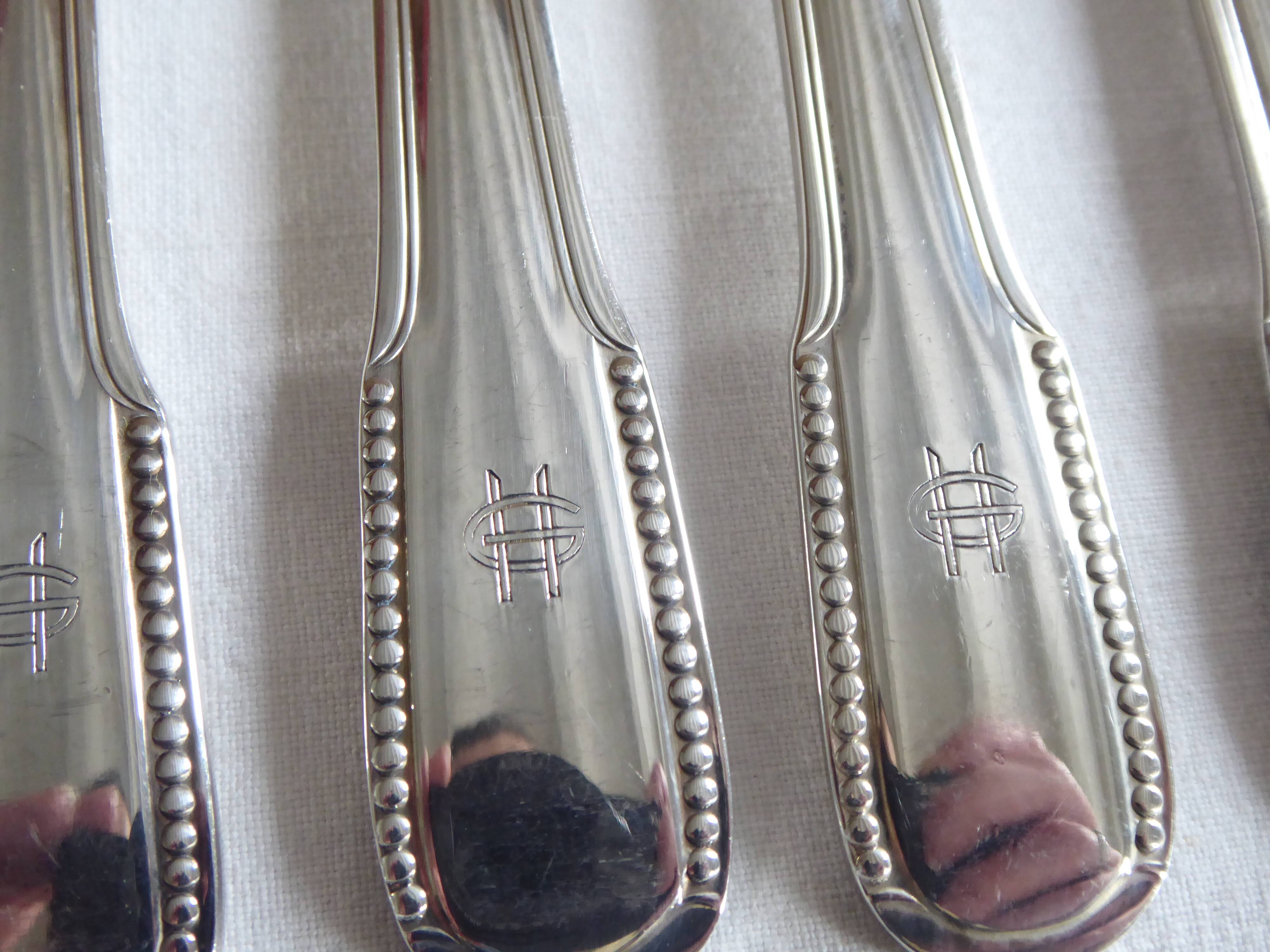 12 dessert forks, silver metal