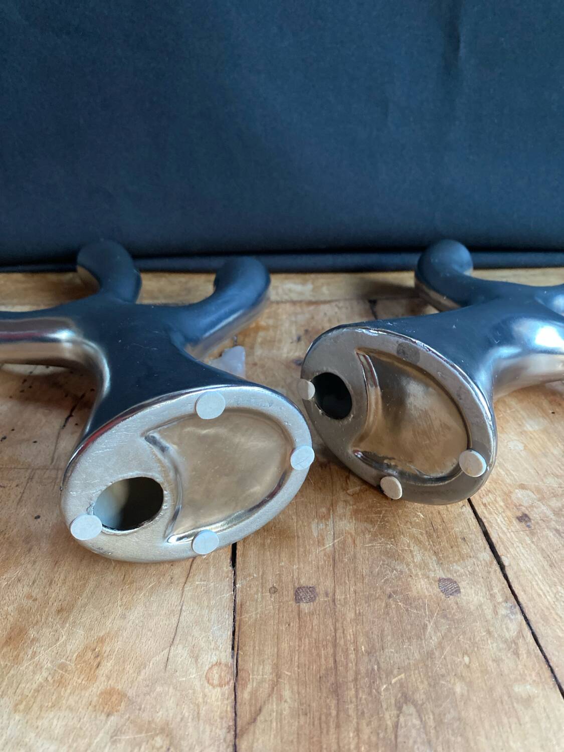 Silver candlesticks in the shape of a 3-branch tree