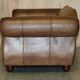 Vintage leather sofas by Thomas Lloyd with Kilim cushions.