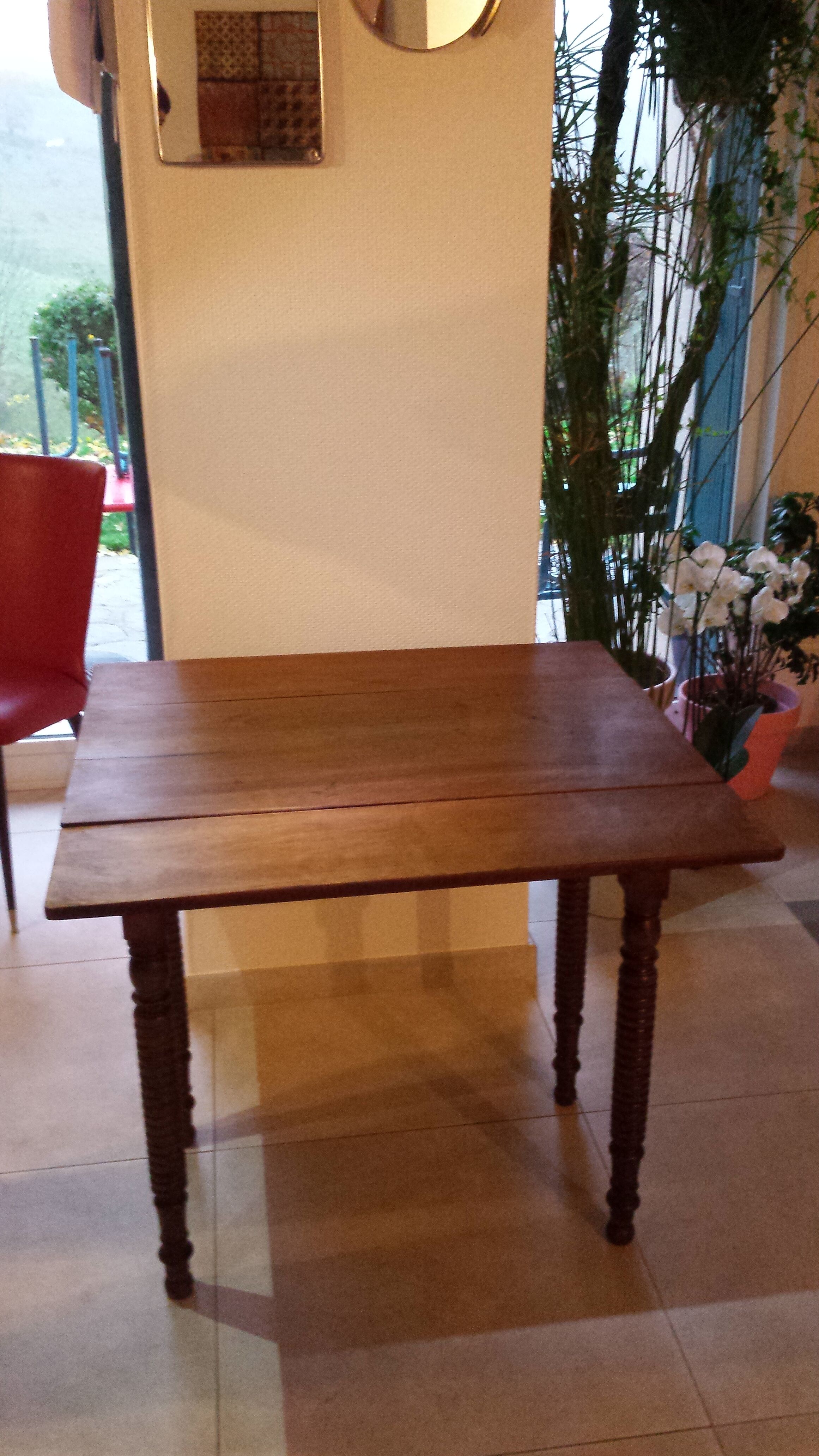 Wooden table with extensions