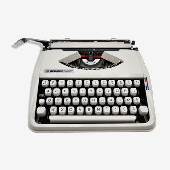 Machine à écrire blanche révisée ruban neuf Hermes baby