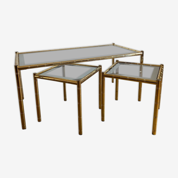 Trio of vintage bamboo-style golden metal and glass tables