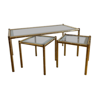 Trio of vintage bamboo-style golden metal and glass tables