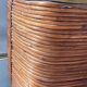 Rattan plant pot rimmed with brass from the 60s and 70s