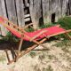Former pliante long chair - wood foot rest - vintage red fabric