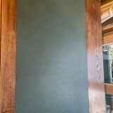 Solid wood desk and green leather writing pad