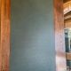 Solid wood desk and green leather writing pad