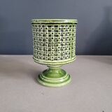 Green glazed ceramic flowerpot on stand