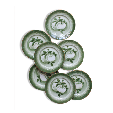 7 earthenware dessert plates with apple decoration and slip-brushed rim, KG Lunéville