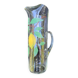 Glass pitcher decorated with lemon tree decoration
