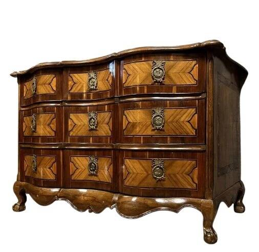 Louis XV period Arbalète chest of drawers in 18th century noble wood marquetry
