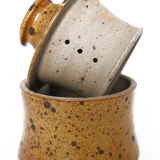 Handmade and rustic water butter in pyrity sandstone