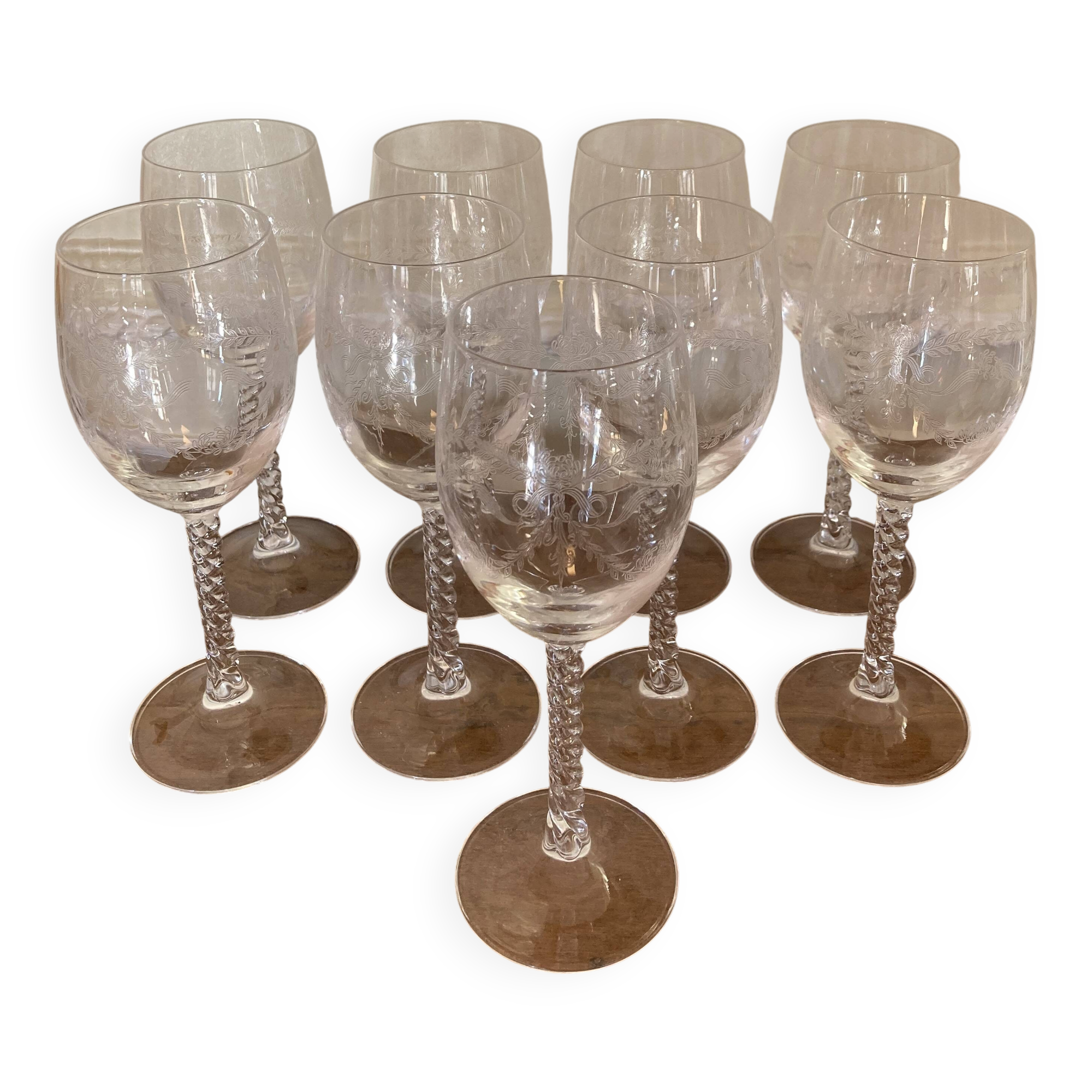 Set of 9 tall twisted and engraved crystal wine glasses