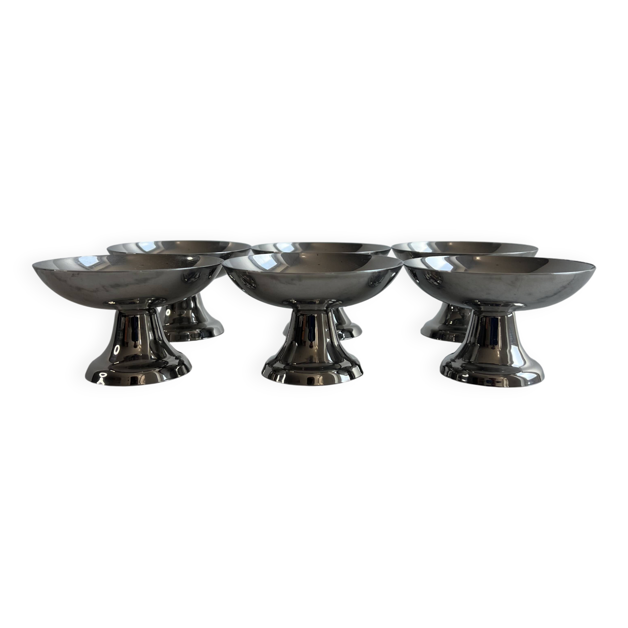 Set of 6 stainless steel dessert bowls on a stand.