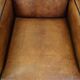 Set of 2 characterful, comfortable armchairs made of sheepskin leather with a sleek Art Deco design