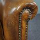 Club chair in patinated sheepskin