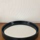 Vintage round mirror in black gilac plastic