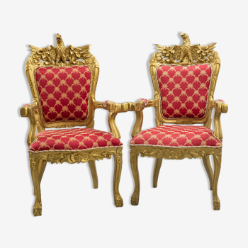 Paire de fauteuils rouge et bois doré à décor d'aigle