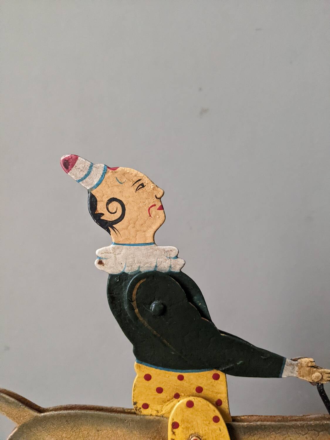 Antique pull toy, metal, hand-painted decoration, clown circus