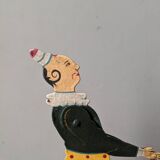 Antique pull toy, metal, hand-painted decoration, clown circus