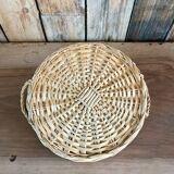 Vintage round flat rattan basket