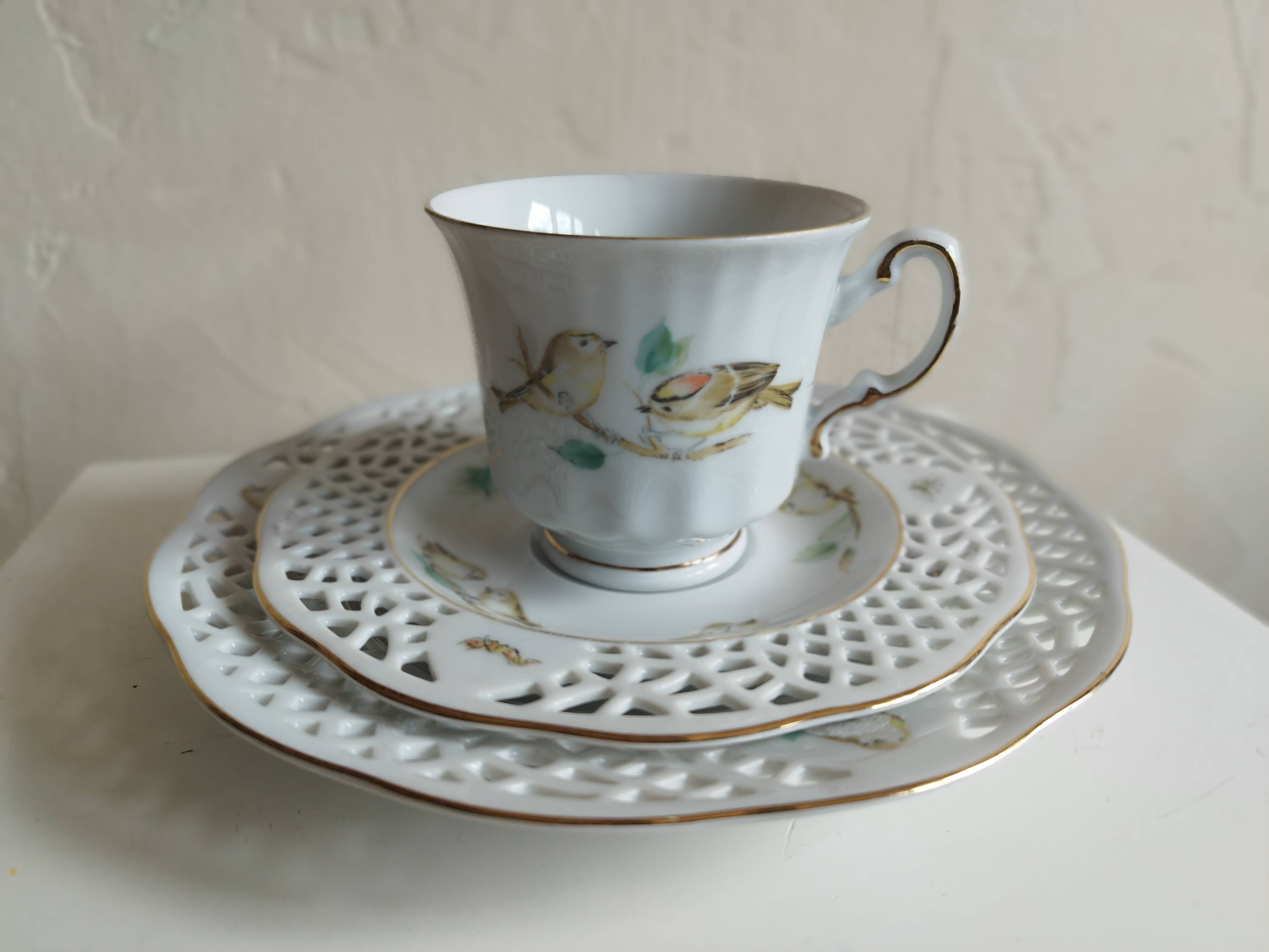 Porcelain cup and cake plate with bird decor