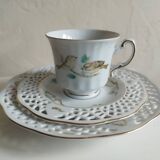 Porcelain cup and cake plate with bird decor