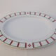 Set of basque porcelain green and red plates with 1 oval dish