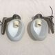 Pair of brushed steel appliques, half-egg opaline, 1970