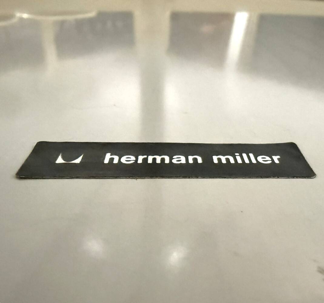 Round dining table by Charles & Ray Eames, Herman Miller, 1960s.
