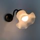 Pair of vintage brass gooseneck wall sconces and glass tulip. Year 60