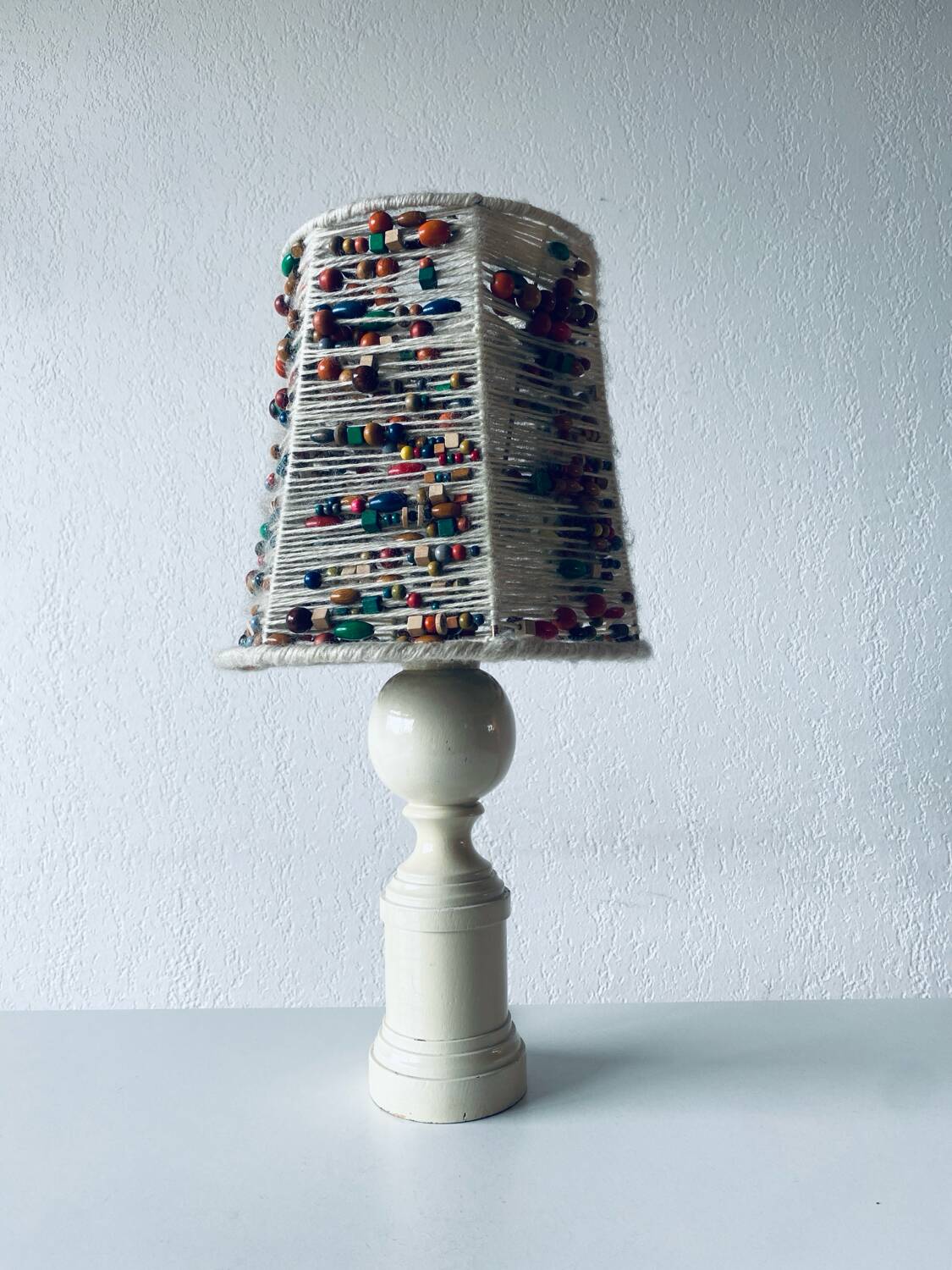 Lamp in turned wood and beads