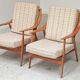 Pair of Boomerang-style armchairs in ecru beige fabric, 1960s.