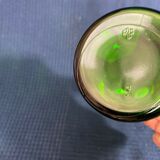 Green glass bottle and Louis style gilding