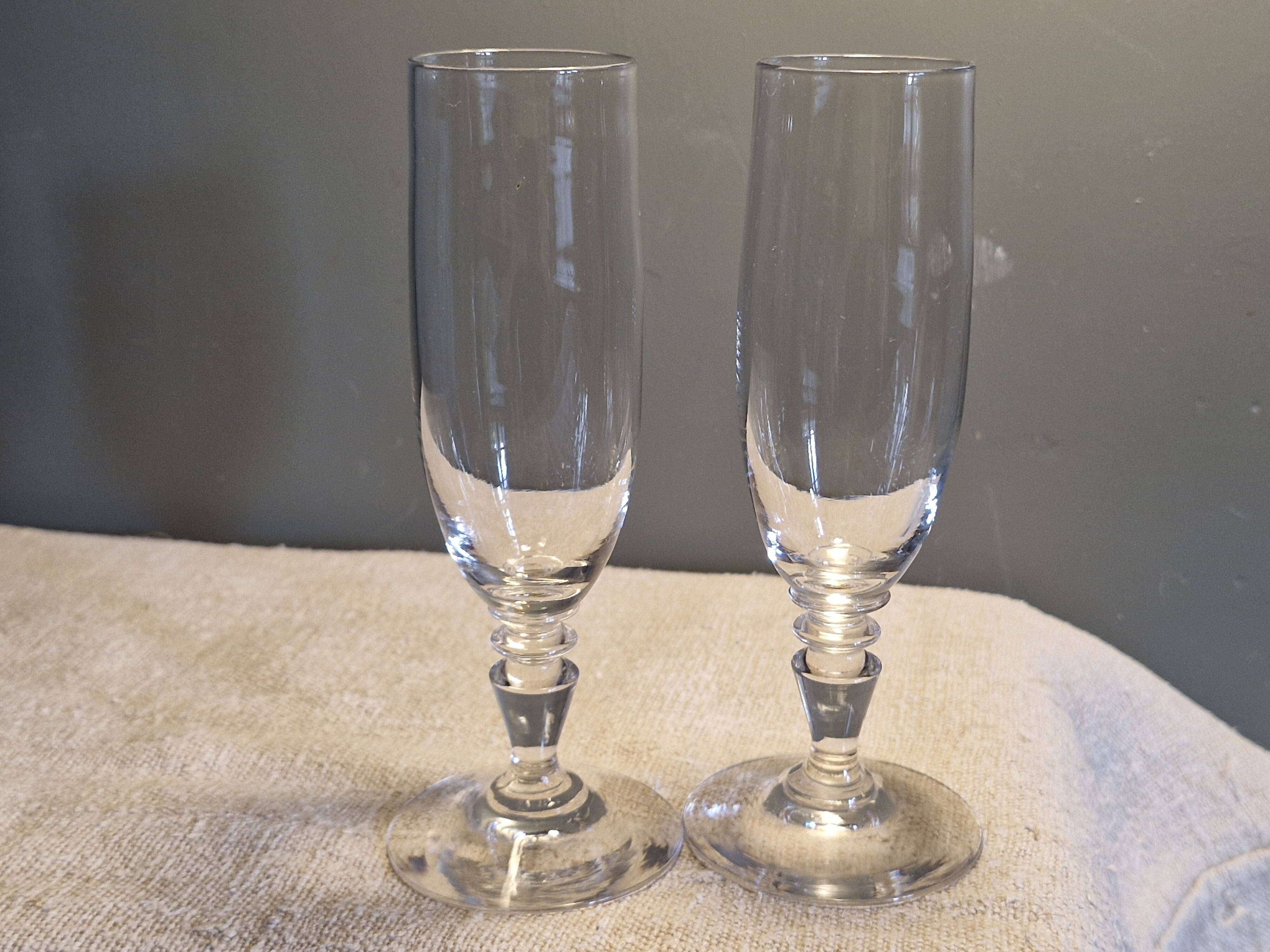 2 antique crystal champagne flutes