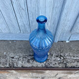 Blue glass decanter with a moon star motif