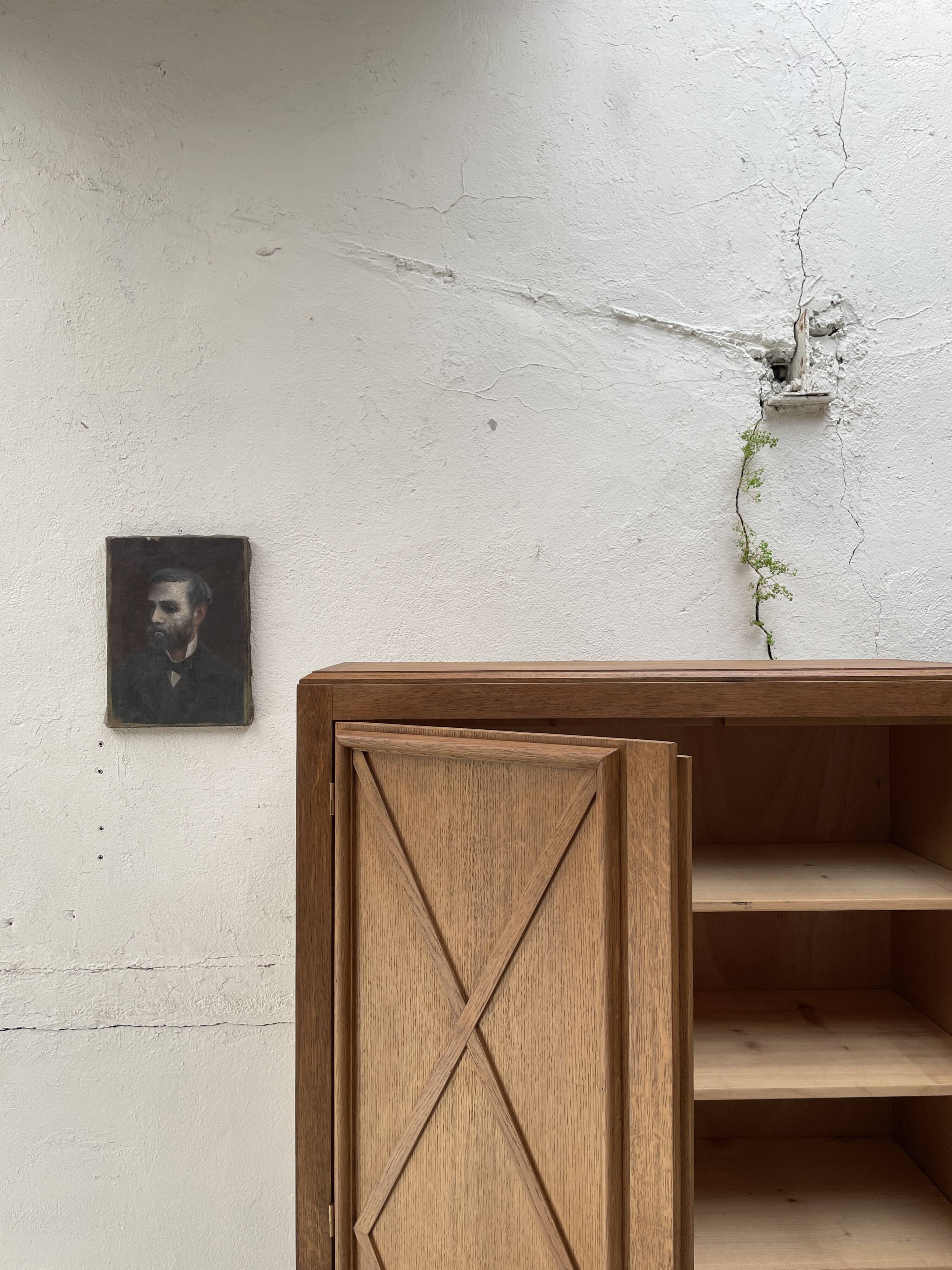 Storage unit in solid oak and veneer, circa 1960.