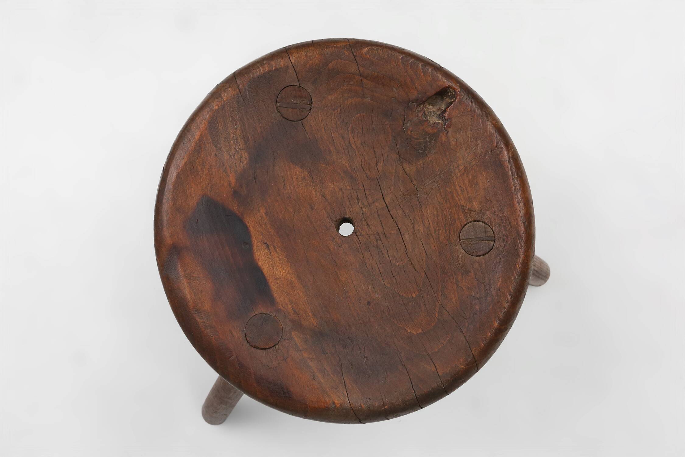 Hand-carved solid wood tripod stool with beautiful patina, France ca. 1900