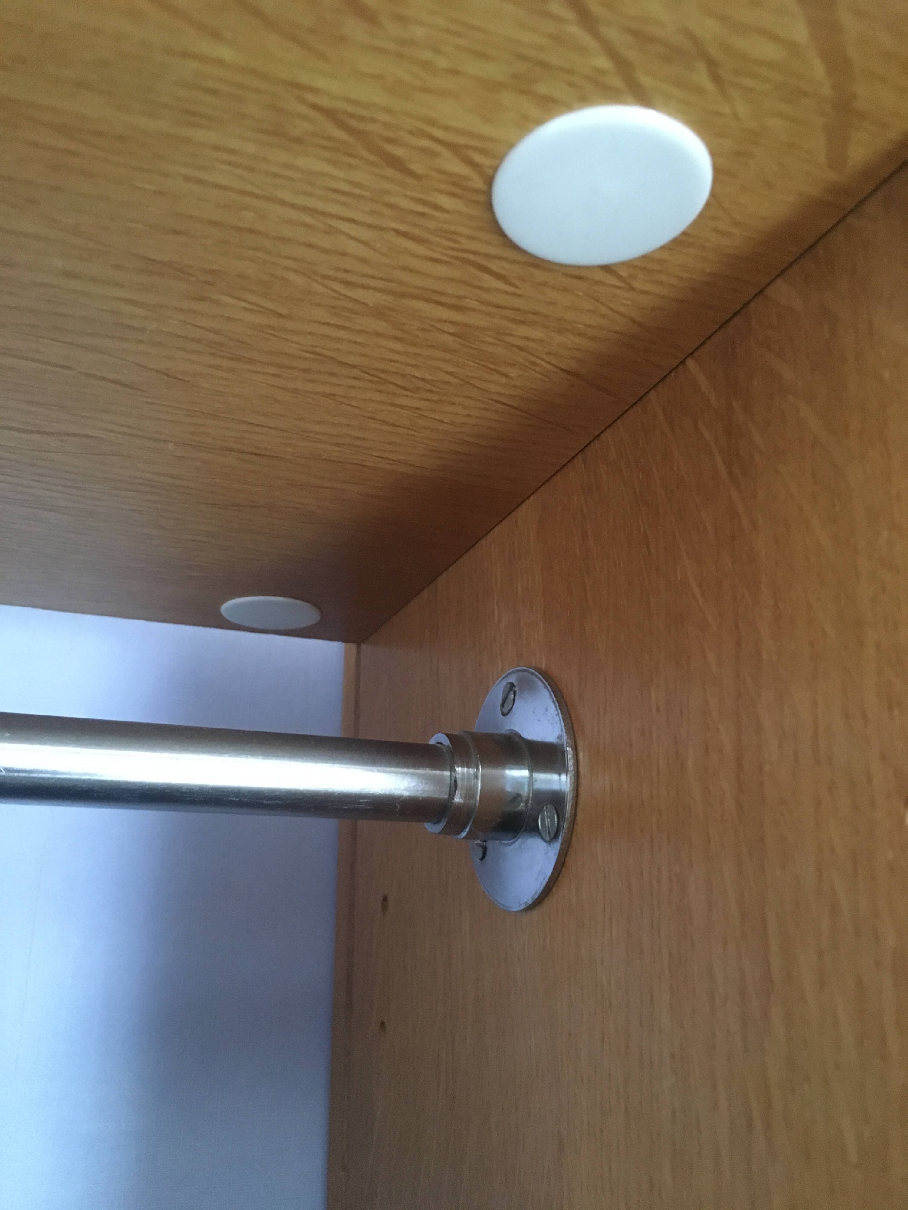 Dressing vintage Scandinavian style in light wood with wardrobe and cupboard.