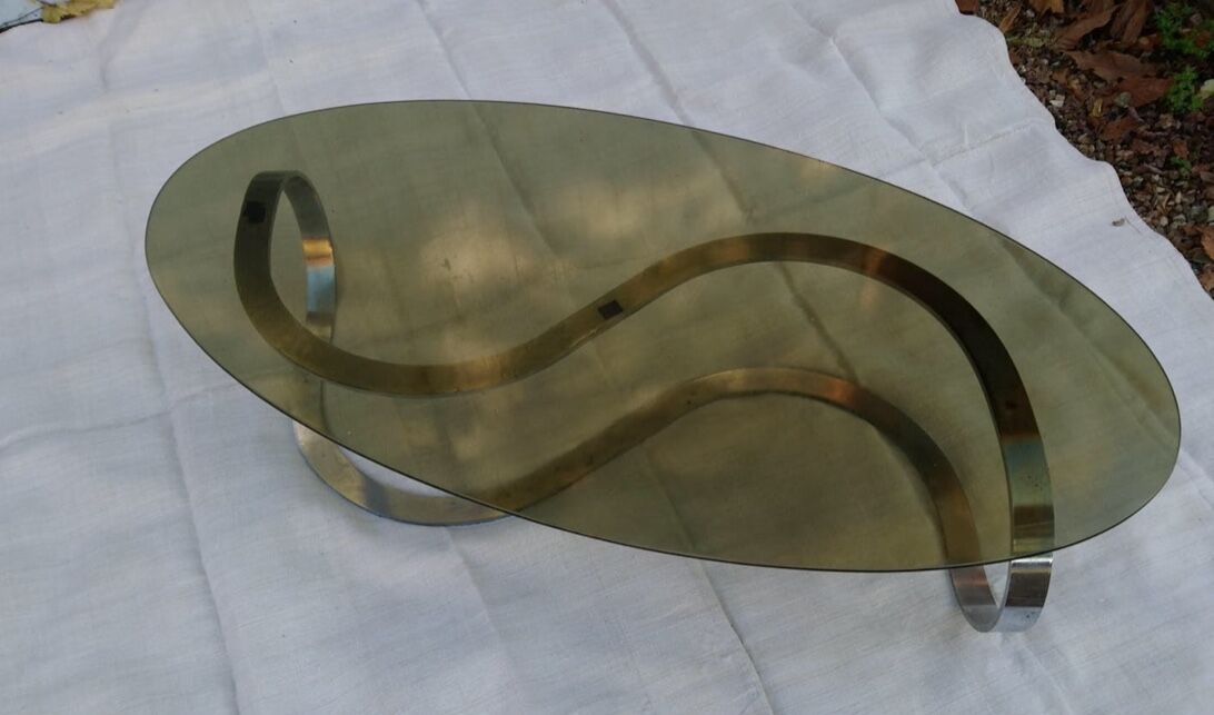 Coffee table oval smoked glass of the 1970s