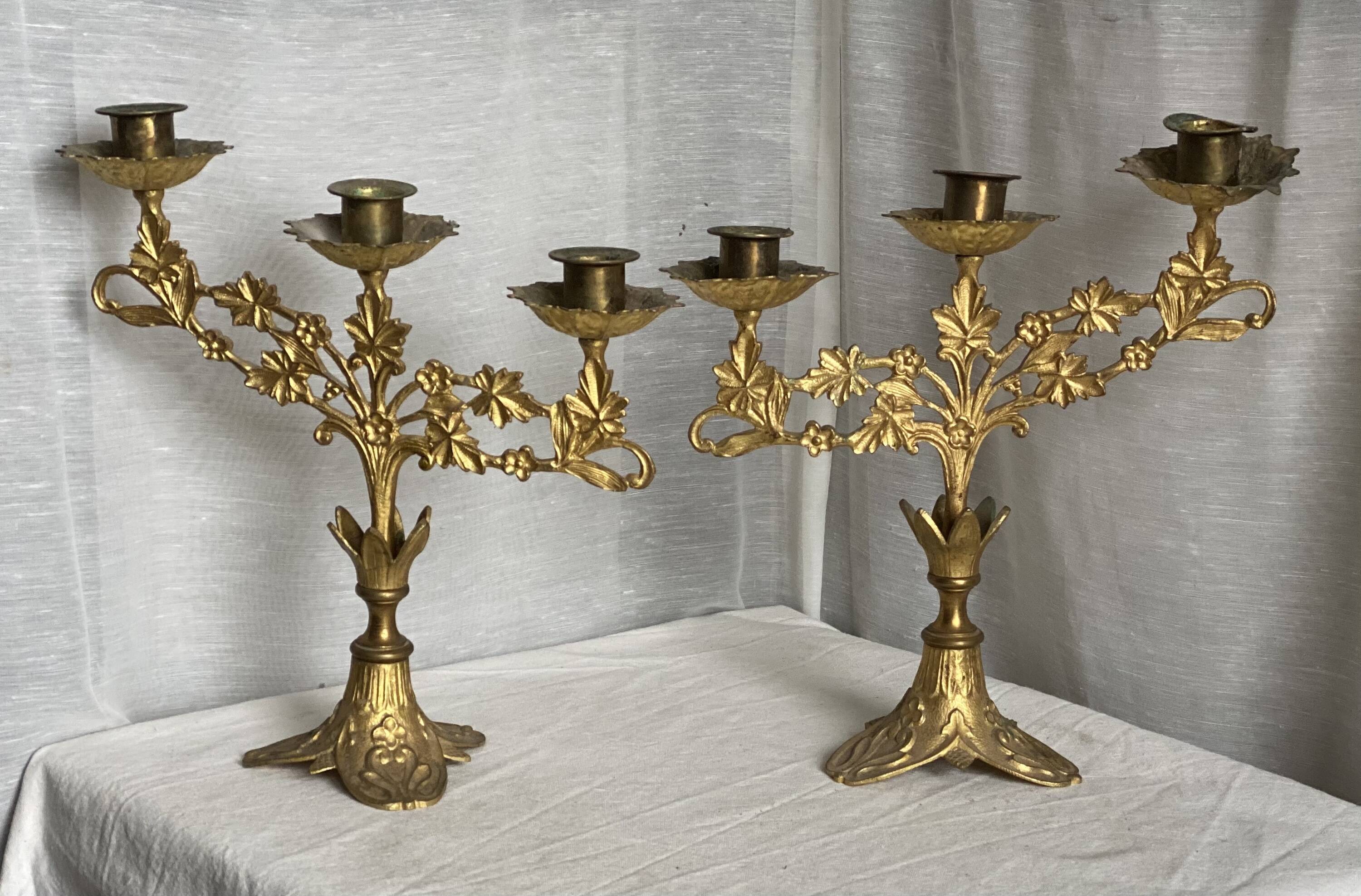 Set of 3 gilt metal candlesticks from the early 20th century.