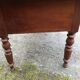Old farmhouse table with cherry and chestnut panels with 3 drawers.