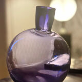 Purple vase inclined