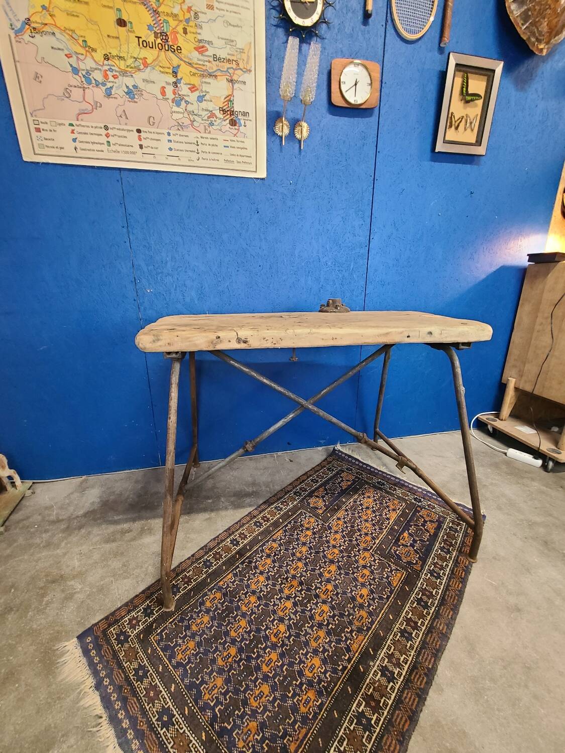 Vintage workbench circa 1930, folding metal leg.