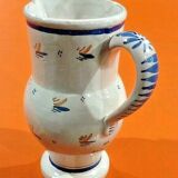 Pitcher decoration at the Breton Faïence of Quimper