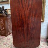 Victorian extendable dining table. Rosewood, bronze decoration. England. Early 19th century.