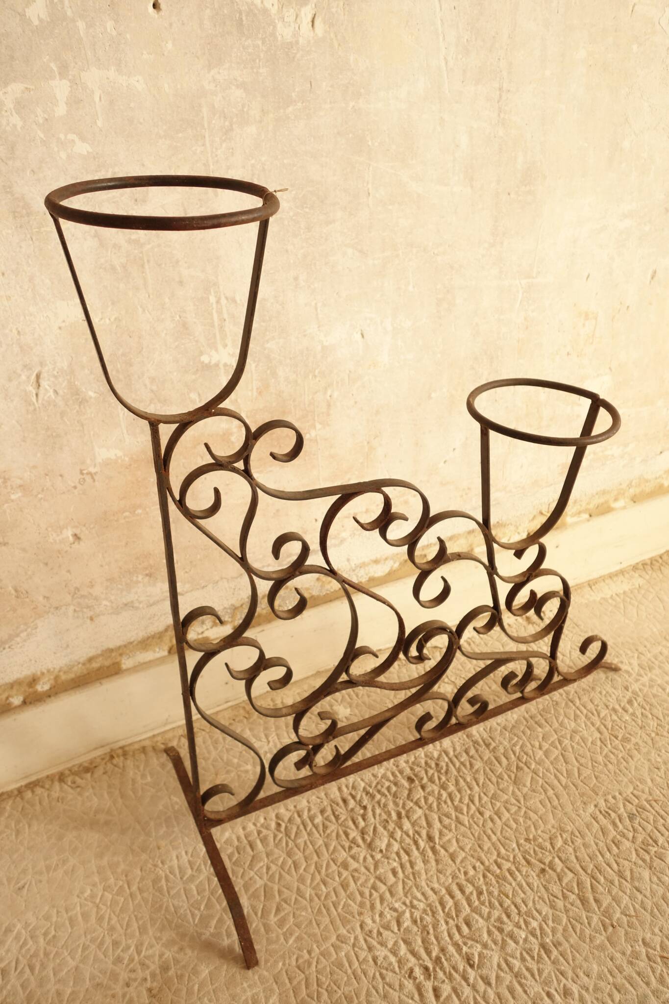 Antique wrought iron plant stand