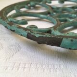 Dessous de plat en fonte vert doré